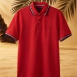 Polo Tommy Wicking De Corte Regular color Rojo.