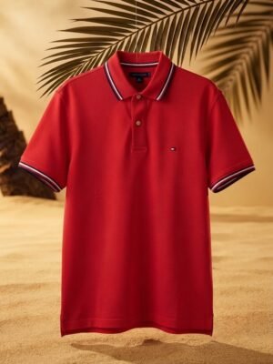 Polo Tommy Wicking De Corte Regular color Rojo.